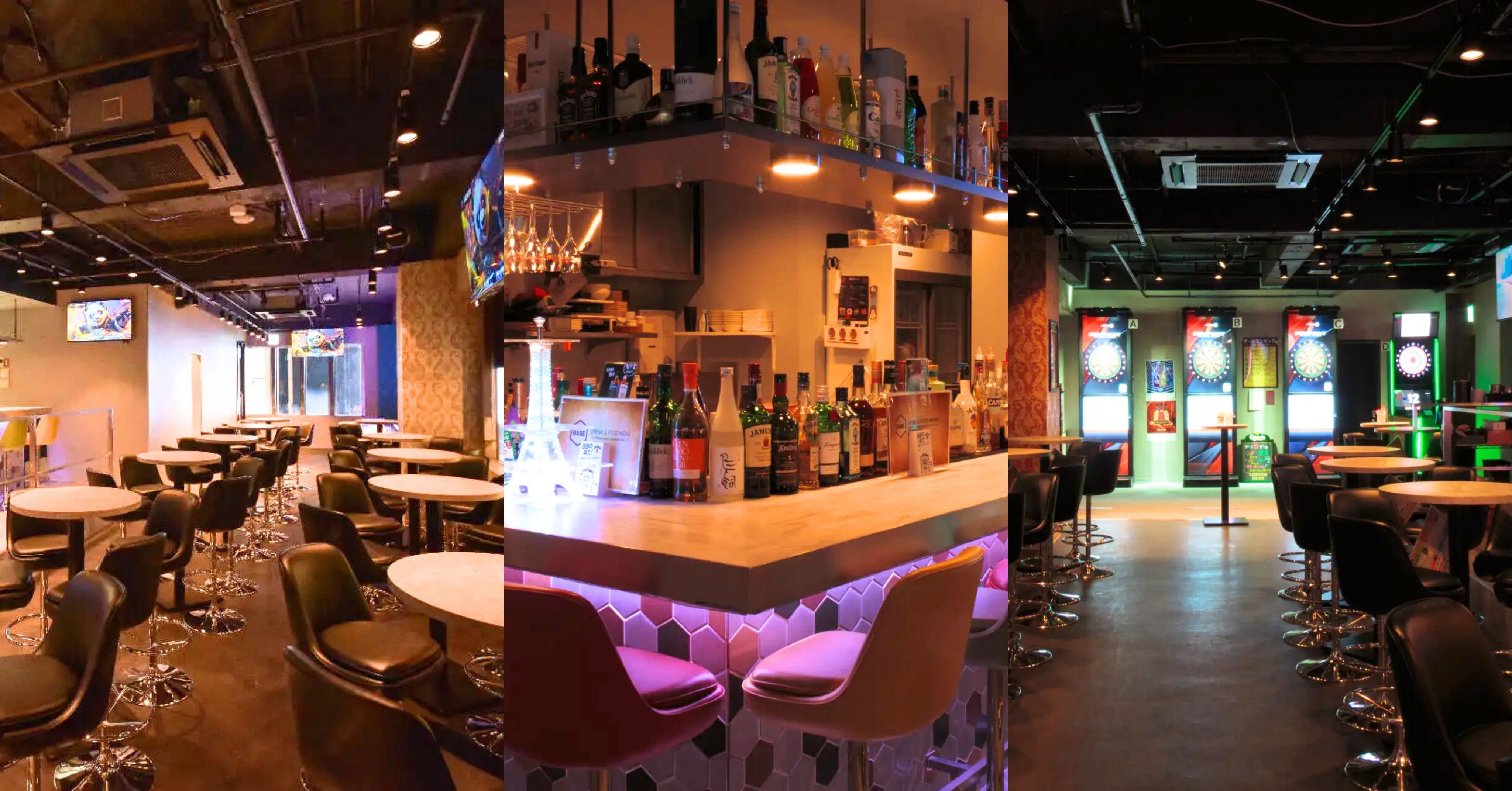 ダーツ&ビアポン BASE2 新宿歌舞伎町店の店内。通路の両側にハイテーブル席が並び、奥にダーツマシンが見える。